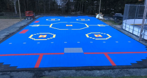 Une surface de dek hockey grandeur 10'X 10'